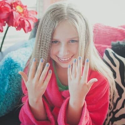 Beautiful Girl showing her newly manicured nails